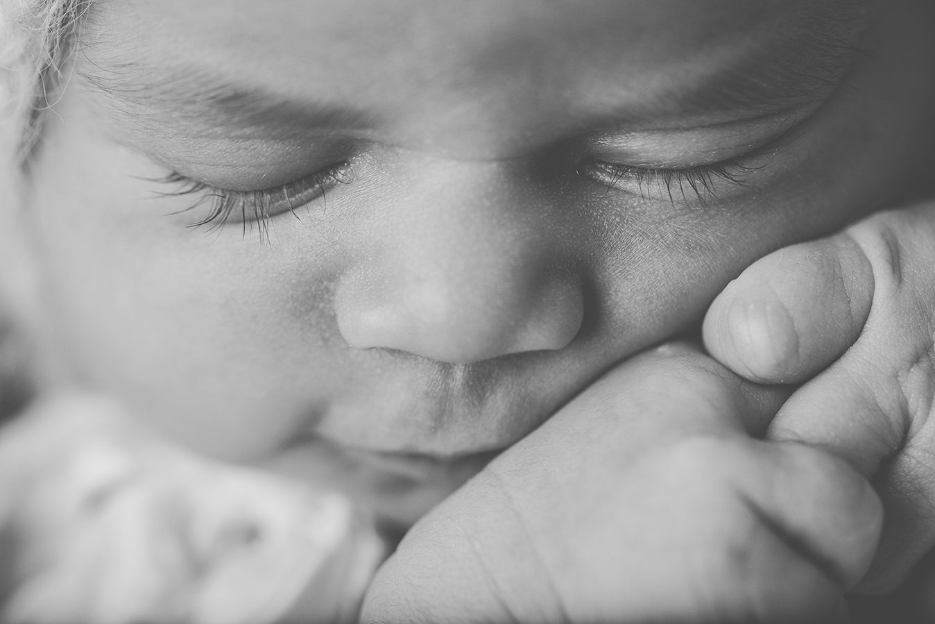 black and white close up posed newborn photography
