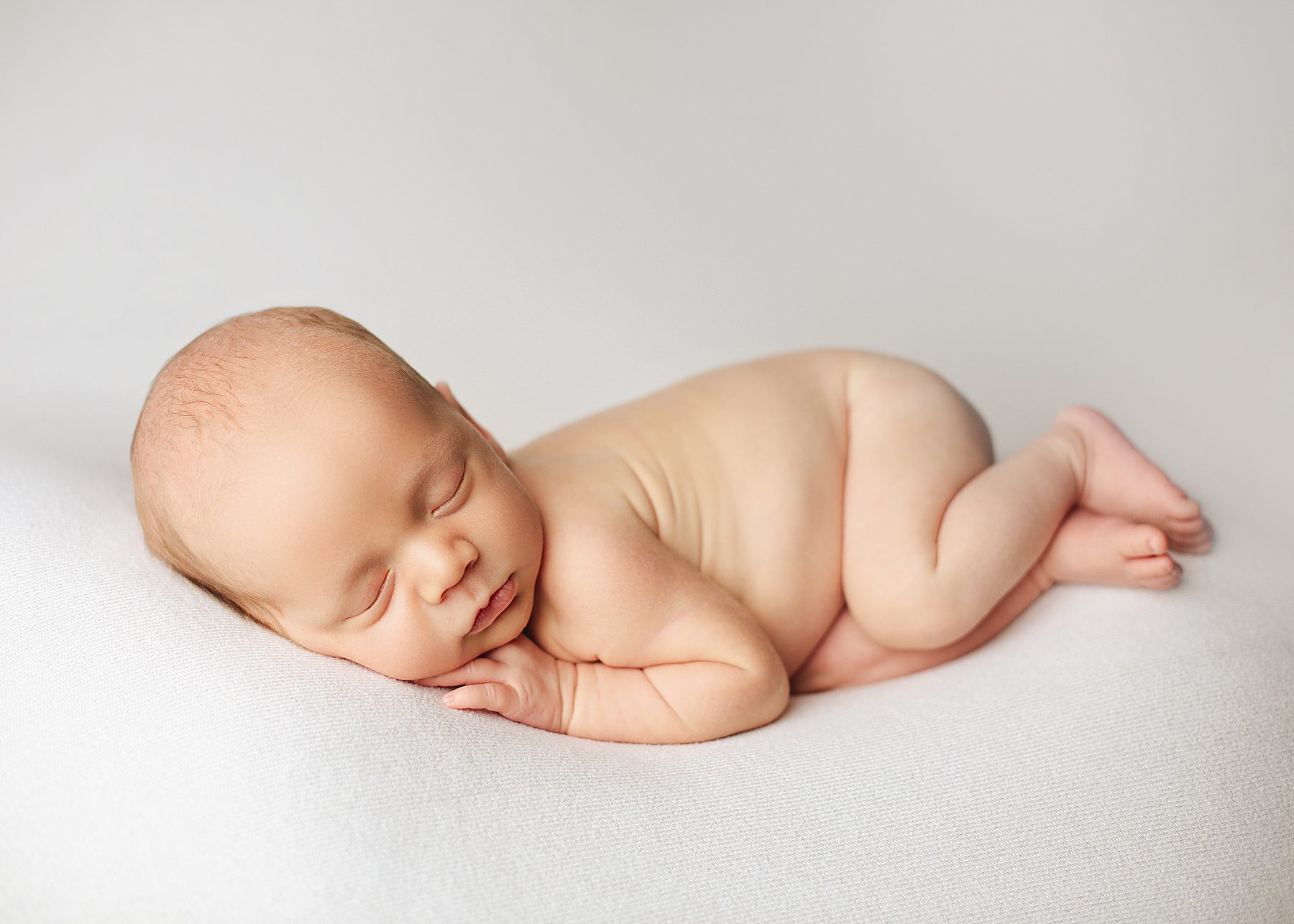 edmonton newborn photographers, newborn photography edmonton, tucked in pose, newborn boy poses, leduc newborn photographer, side sleeper pose