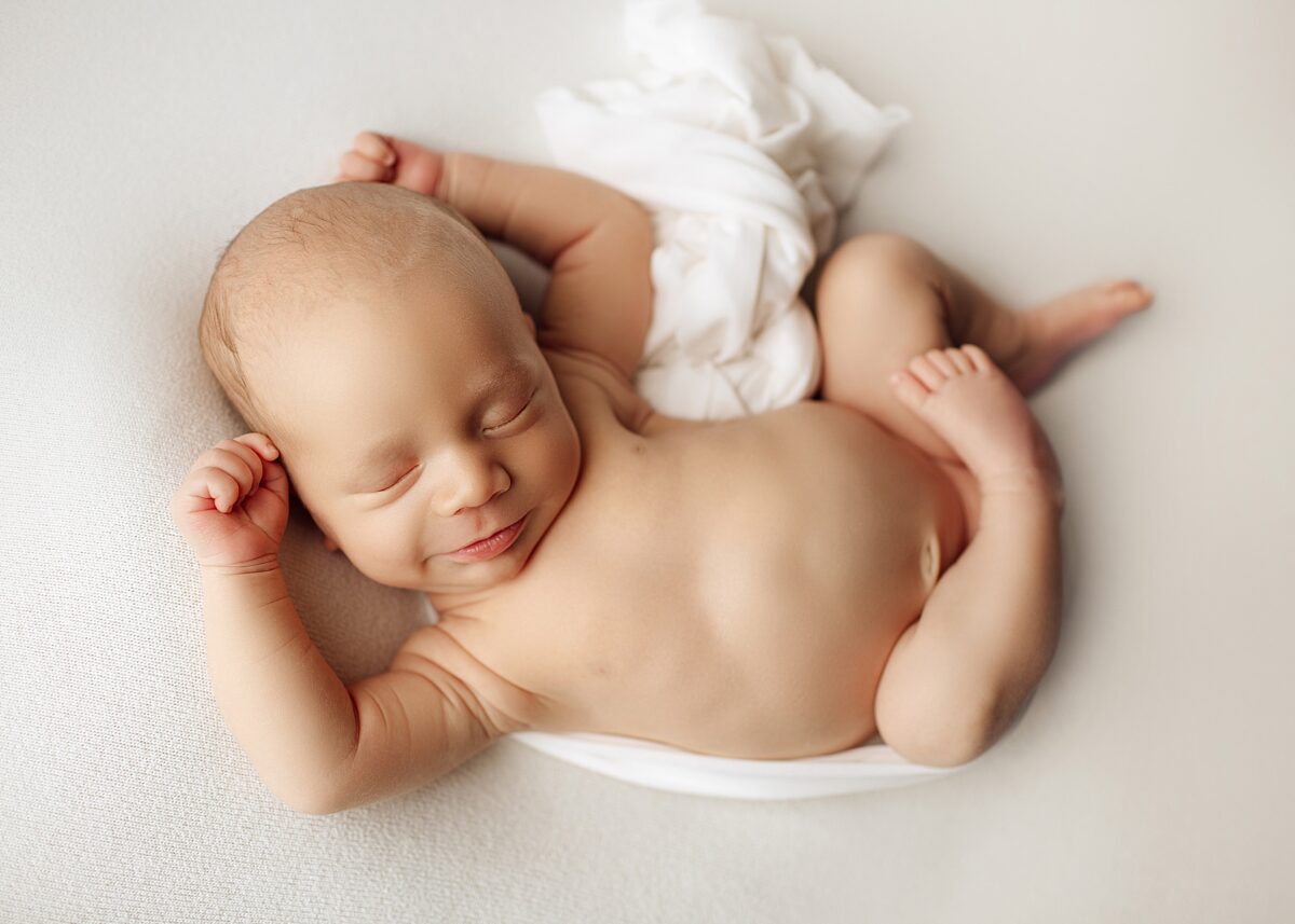 edmonton newborn photographers, newborn photography edmonton, tucked in pose, newborn boy poses, leduc newborn photographer