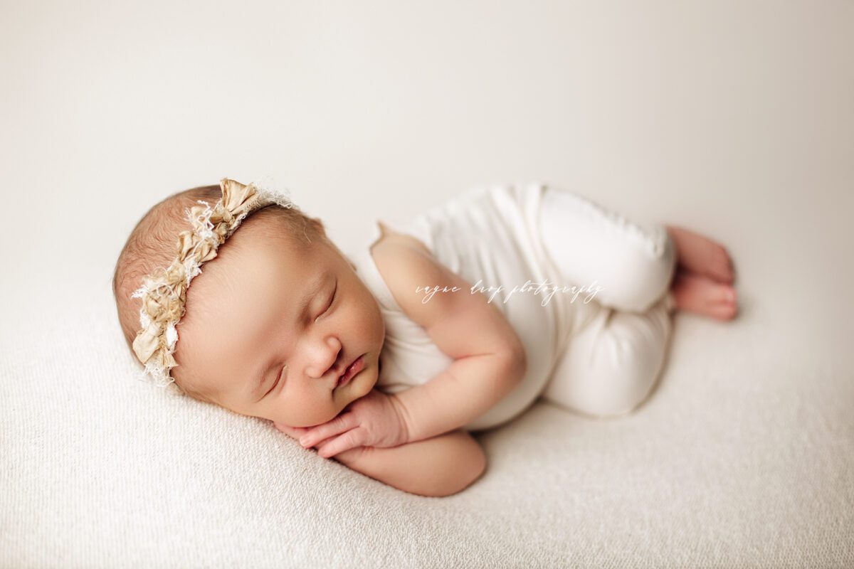 newborn baby girl in white romper, Newborn photographers edmonton, leduc newborn photographers