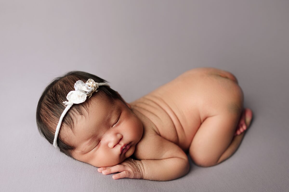 newborn photographer bum up pose, newborn baby girl on tummy, newborn photographers, edmonton newborn photographers 