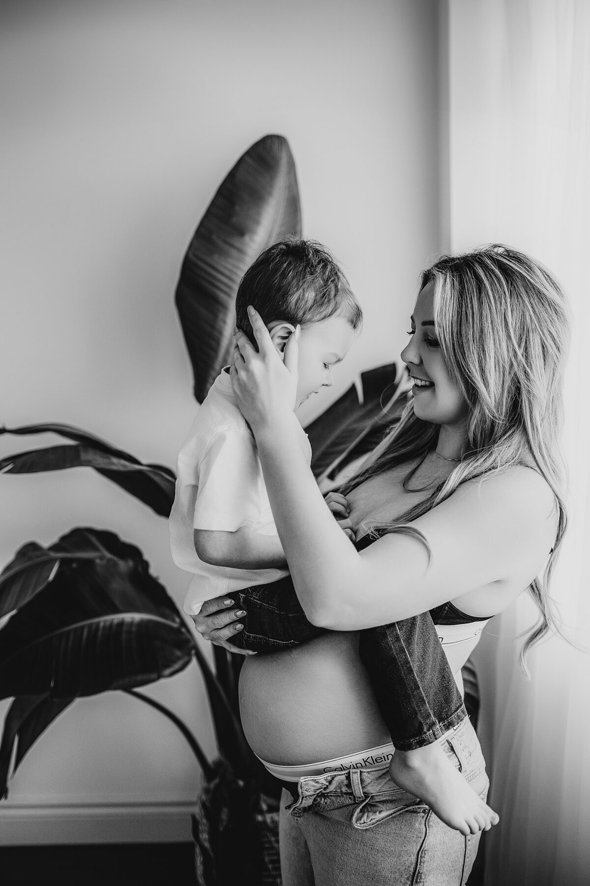 calvin klein maternity, edmonton maternity photographer, edmonton newborn photographer, edmonton maternity photographers, edmonton newborn photographers, high fashion, maternity gown, casual studio maternity, fabric tossing, sibling maternity